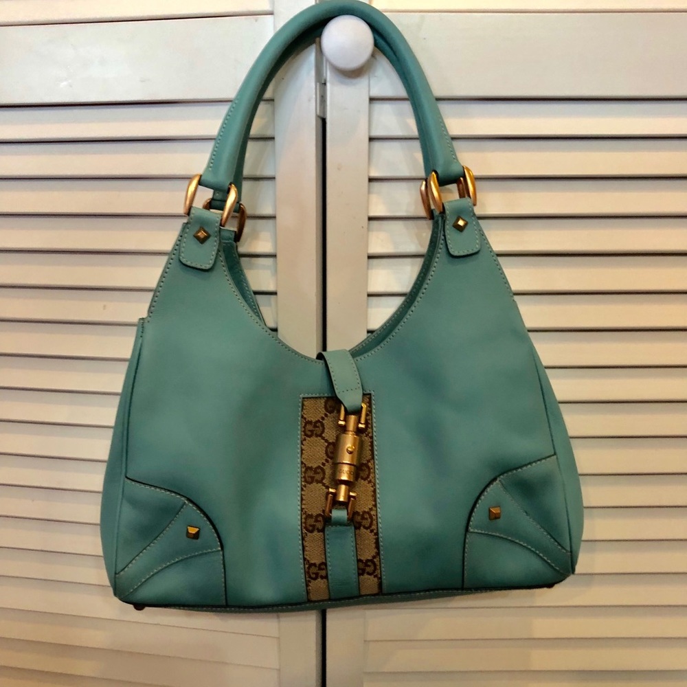 Authentic Jackie Gucci hand bag light blue.